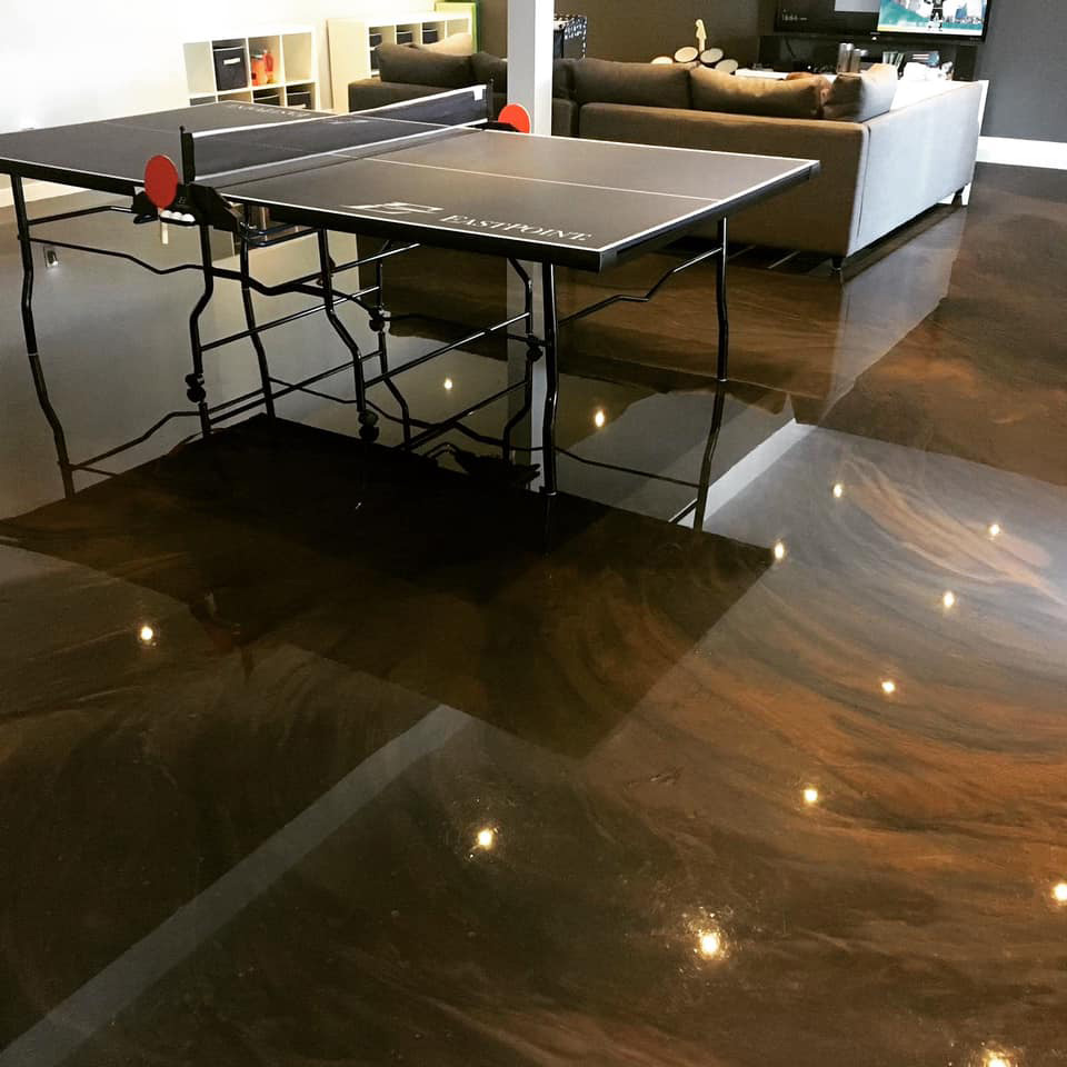 brown basement floor coating with ping pong table