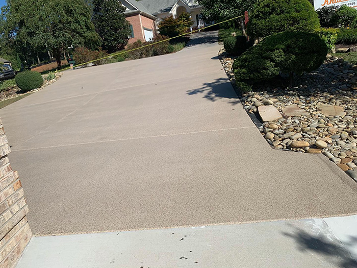 A beautiful patio with a grey stone walkway