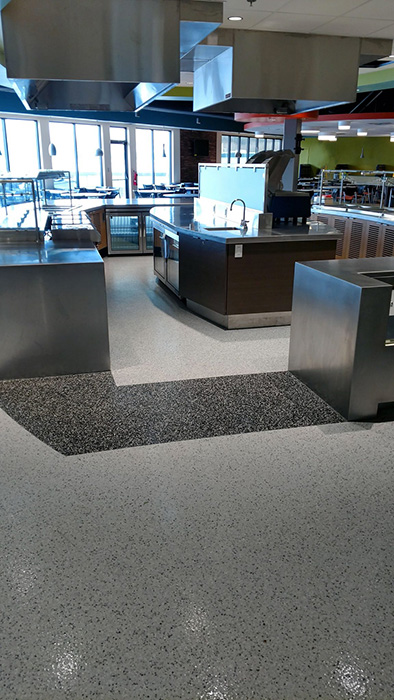 restaurant with white and black floor coating