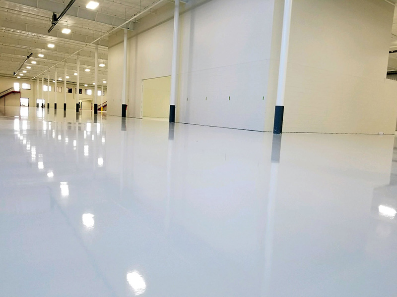 warehouse with white floor coating